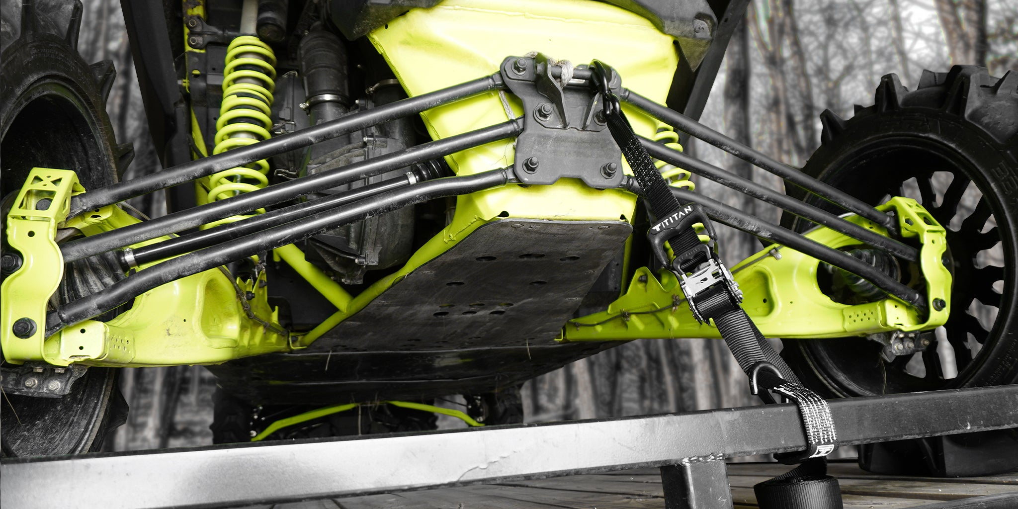 Side by Side UTV on trailer with Titan Anchor's Ratchet Straps