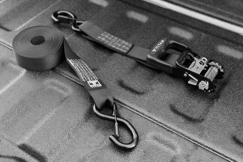 titan anchor ratchet straps on a bed of a truck
